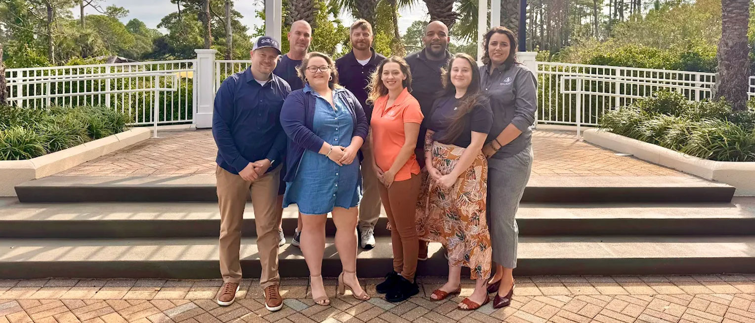 Happy team standing together