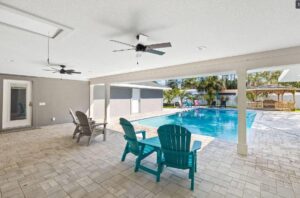 The backyard pool area of a Panama City Beach rental to relax in after spending time at Oktoberfest.