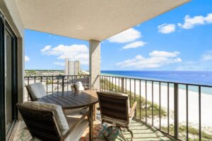 The balcony of a Panama City Beach rental near places to play mini golf.